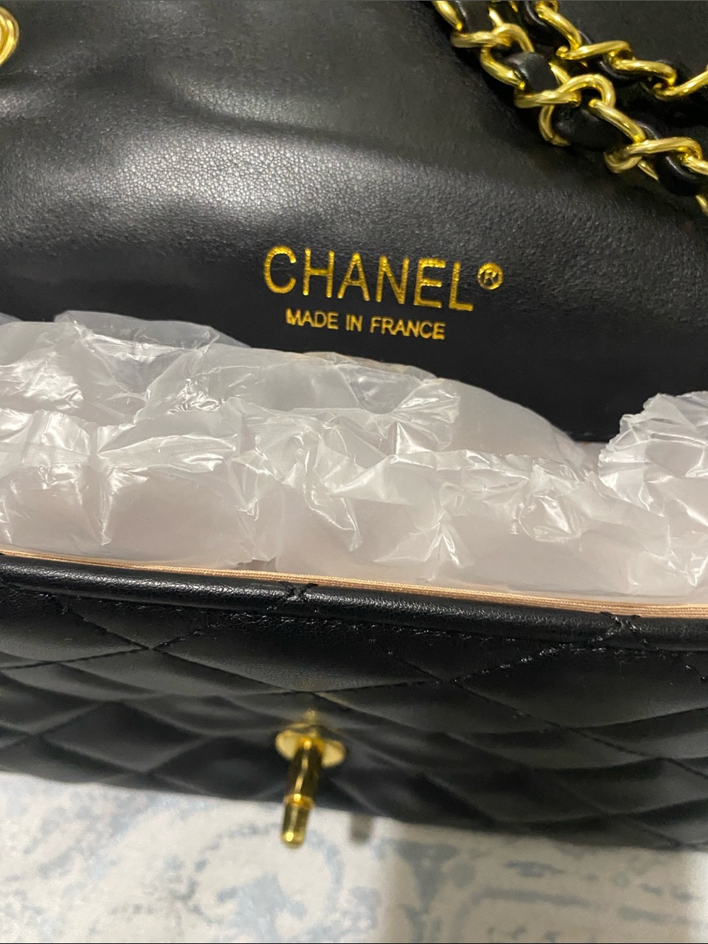CHANEL Black Quilted Shoulder Bag with Gold Chain and Iridescent CC Turnlock - Picture 9 of 9
